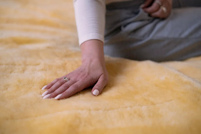 Double mattress made of warming sheepskin wool