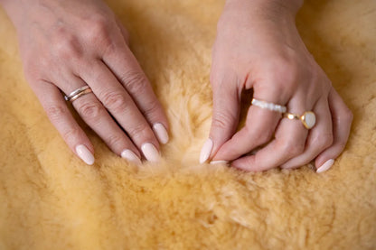 Double mattress made of warming sheepskin wool