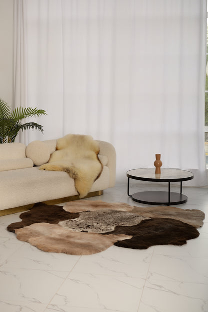 The Mossi rug is crafted from six natural sheepskins in deep brown tones.