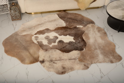 Mossi rug is crafted from six light brown trimmed sheepskins