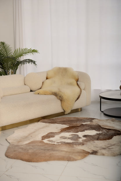 Mossi rug is crafted from six light brown trimmed sheepskins