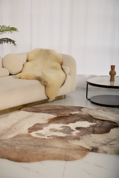 Mossi rug is crafted from six light brown trimmed sheepskins
