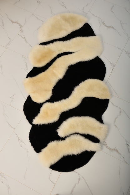 The Chamomile rug, crafted from genuine black-and-white mouton
