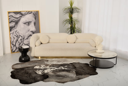 The Mossi rug in dark gray is made from six natural sheepskins.