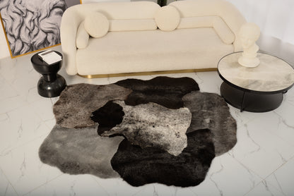 The Mossi dark gray trimmed rug 