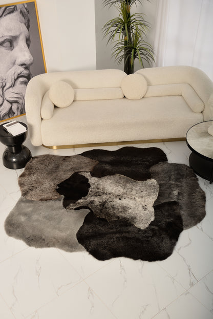 The Mossi dark gray trimmed rug 