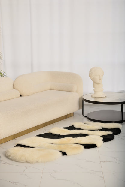 The Chamomile rug, crafted from genuine black-and-white mouton