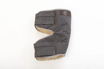 Knee pad made of warming sheepskin wool in grey color